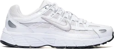 A white Nike P-6000 sneaker shown from the side.