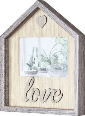 A house-shaped photo frame with the word "love" and a heart decoration.