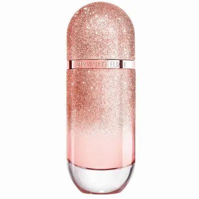 A glitter-covered perfume bottle with a rose gold gradient.