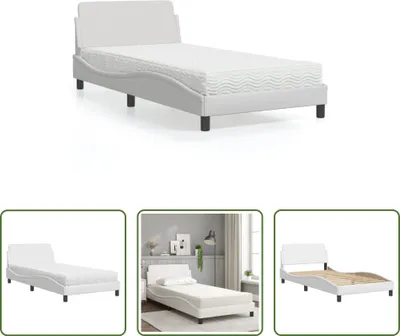 A white bed frame with a mattress on a white background.