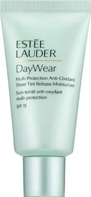 A close-up studio shot of a light green tube of Estée Lauder DayWear Multi-Protection Anti-Oxidant Sheer Tint Release Moisturizer with a silver cap.
