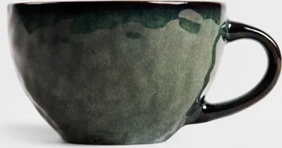 A dark green ceramic mug with a handle against a white background.