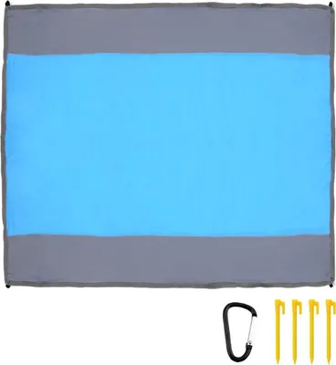 A flat lay of a picnic blanket with accessories.