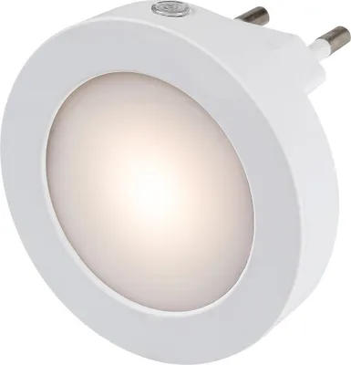 A white, round LED night light with a plug.