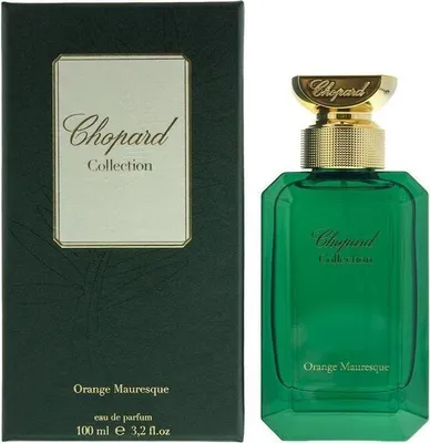 A perfume bottle and its packaging are displayed against a white background.