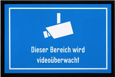 Produktbild von Fußmatte mit lustigem Spruch dieser Bereich ist videoüberwacht Überwachungskamera ironisch sarkastisch rutschfest & waschbar Moonworks® weiß 60x40cm