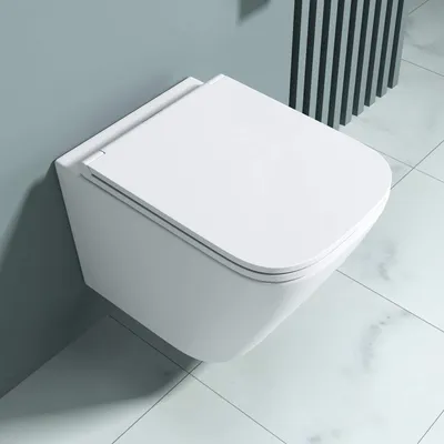 A modern, wall-mounted toilet in a bathroom setting with light gray walls and white tiled floor.