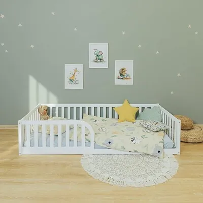 Imagen del producto de Cama Montessori Milava de 90x200 cm, cama con base de láminas, fabricada en madera de pino con barandilla de 40 cm, con posibilidad de montaje de la entrada a la izquierda o a la derecha, color blanco