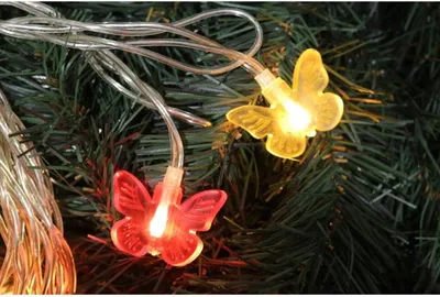 Productafbeelding van Meerkleurige LED-kerstverlichting met siliconenvlinders - 20 stuks, op batterijen