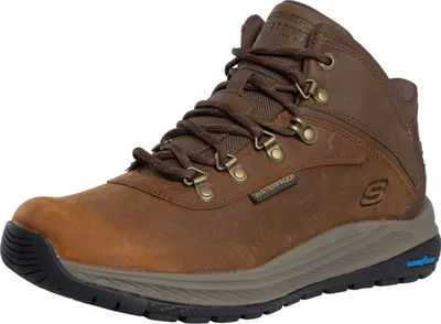 A brown hiking boot is shown against a white background.