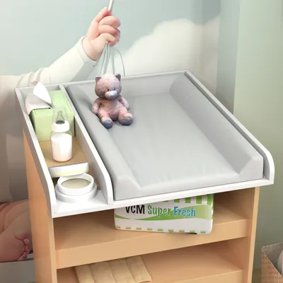 A baby changing station with accessories.
