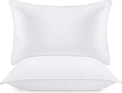 Obrázok produktu pre Sada dvoch vankúšov Unyqoos®, 50 x 70 cm – mäkké, priedušné vankúše z polyfázovej výplne s protišmykovou konštrukciou, biele