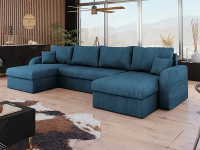 A U-shaped sectional sofa in a living room with a large window in the background.