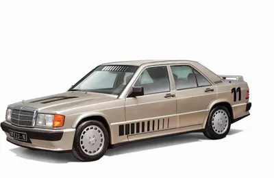 A studio shot of a gold Mercedes-Benz 190E 2.3 16v model car.