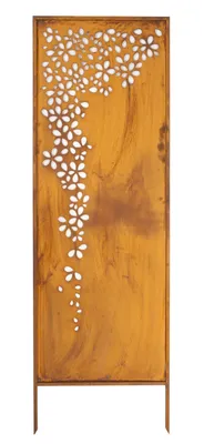 A decorative garden screen with a floral pattern.