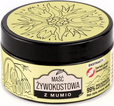 A product shot of a jar of ointment.