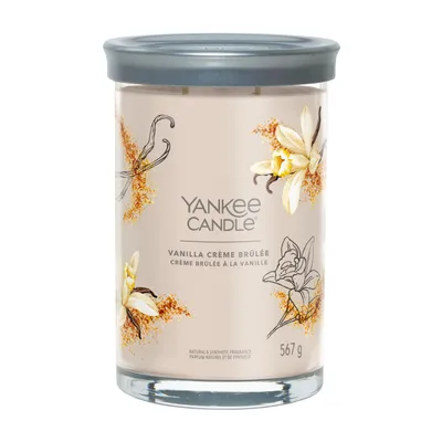 A Yankee Candle jar with a lid, featuring vanilla creme brulee scent.