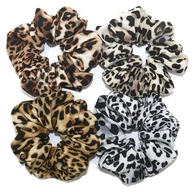 Produktbild von 4 Haargummis für Damen mit Leopardenmuster