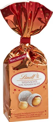 Produktbild von Lindt Weihnachts Macadamia-Nüsse in Nougat und Alpenvollmilch Schokolade 21 x 100 g