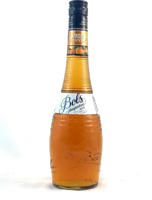 A bottle of Bols Apricot Brandy liqueur against a white background.