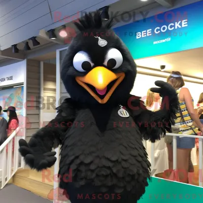 Produktbild von Maskottchenfigur REDBROKOLY eines schwarzen Huhns bekleidet mit einem einteiligen Badeanzug und Armbändern
