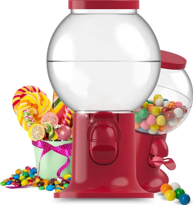 Two red gumball machines with clear globes filled with candy, surrounded by lollipops and loose candies.