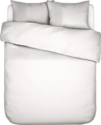 A top-down view of a white duvet cover and pillow set on a white background.