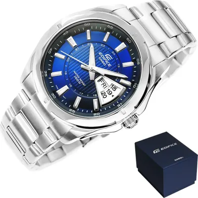 A silver Casio Edifice watch with a blue dial is displayed on a white background, alongside its dark blue presentation box.
