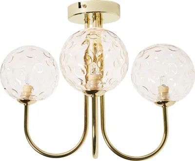 A close-up studio shot of a gold and glass chandelier.
