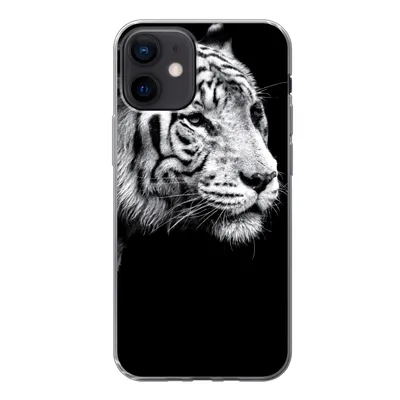 Produktbild von MuchoWow® Handyhülle Schutzhülle Hülle für iPhone 12 Studioaufnahme eines weißen Tigers auf schwarzem Hintergrund Silikon Softcase Handy Hülle - Schutzhülle