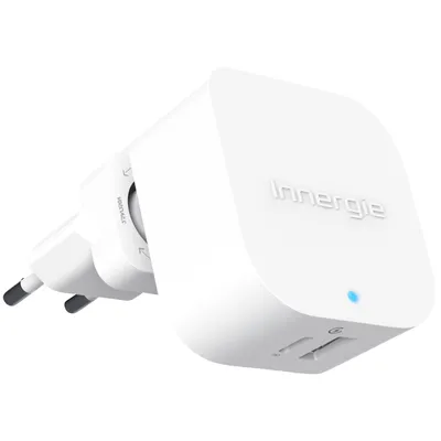 A white Innergie brand USB-C + USB-A wall charger with travel plugs attached.