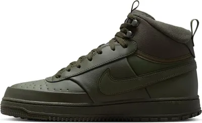 A side view of a green Nike Court Vision Mid Winter sneaker against a white background.