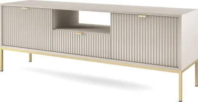 A TV cabinet with fluted doors and gold legs, shown from a three-quarter angle against a white background.