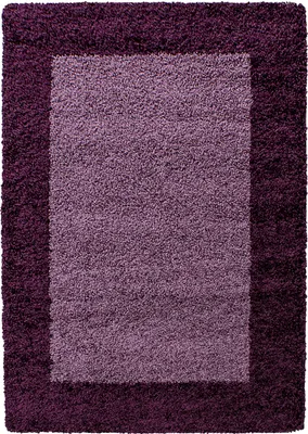 A rectangular rug with a dark purple border and a lighter purple center.