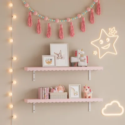 A child's bedroom wall decorated with shelves, garlands, and neon lights.
