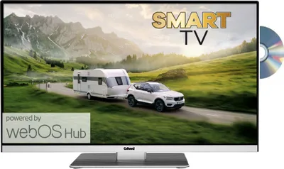 A smart TV displaying a scene of a car towing a caravan on a scenic road, with a DVD disc shown next to it.