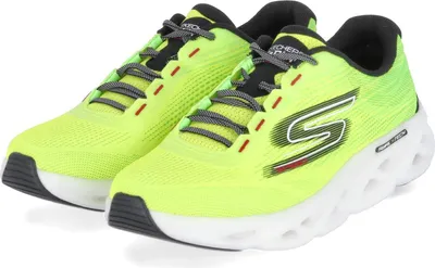 A pair of bright yellow running shoes with white soles and black accents.