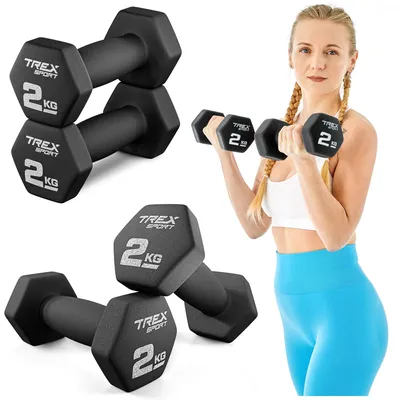 A woman is holding dumbbells, with other dumbbells in the background.