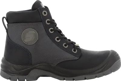 A side view of a black and gray work boot.