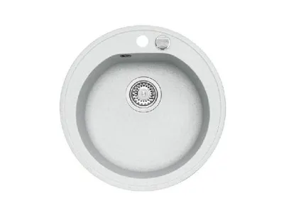 A top-down view of a round, light gray granite sink with a silver drain and faucet hole.
