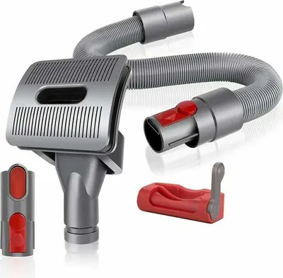 A set of vacuum cleaner attachments for pet hair removal, including a brush head, hose, and adapters, displayed on a white background.