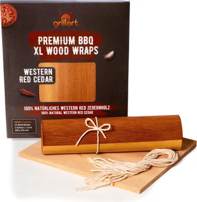 A product box and a rolled-up bundle of wood wraps tied with twine, resting on a wooden board.