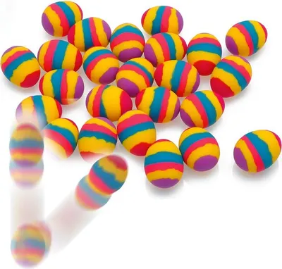 A collection of colorful, striped, egg-shaped rubber balls scattered on a white background.