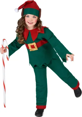 A young girl dressed as an elf, holding a candy cane.