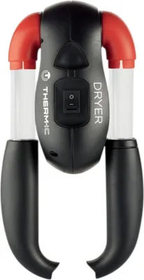 A product shot of a black and red shoe dryer.