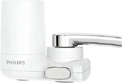 A white Philips water filter attached to a faucet.