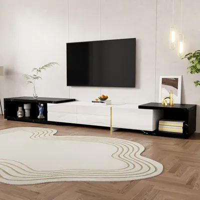 A modern living room with a TV and media console.