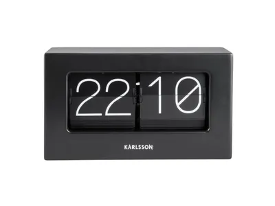 A black flip clock displaying the time 22:10.