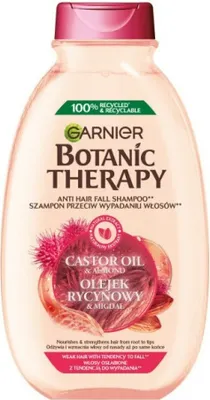 A bottle of Garnier Botanic Therapy shampoo against hair loss.