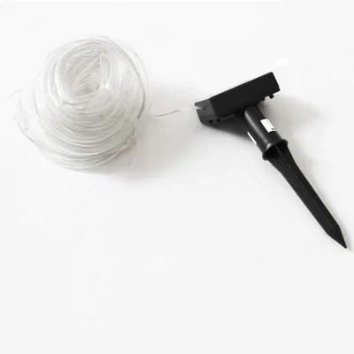 A coiled string of solar-powered LED lights with a stake-like solar panel unit.